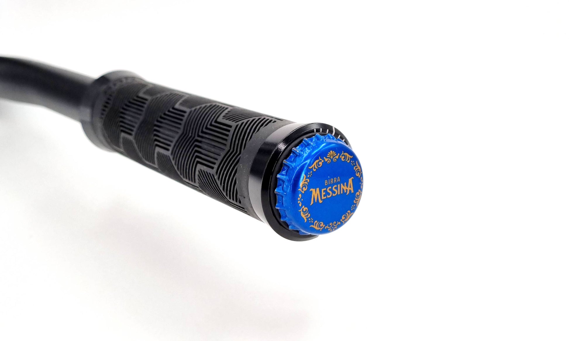 ZINE Beer Your Bike Bar End Plug with a custom beer cap on a wide MTB handlebar during a trail ride stop.